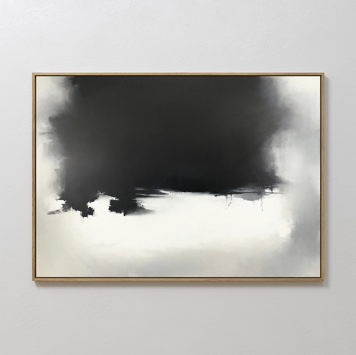 The Ink Cloud Formation Canvas Art - Horizontal features a bold black section that fades into lighter gray and white, adding modern sophistication. This monochrome framed print is showcased beautifully on a simple white wall.