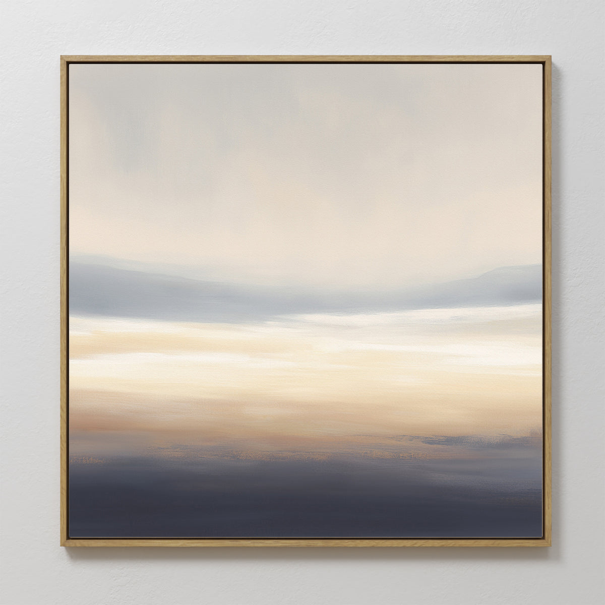 Layered Dusk Canvas Art - Square features soft, blended layers of beige, cream, light blue, and dark blue for a serene misty landscape look. A thin metallic frame adds elegance and Nordic Park vibes to any white wall.