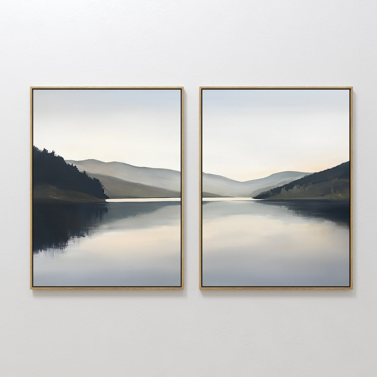 The "Mirror Valley - Set of 2" features framed canvas prints showcasing a tranquil lake, distant hills, and a cloudy sky in muted blues, grays, and greens for a serene Nordic Park vibe.