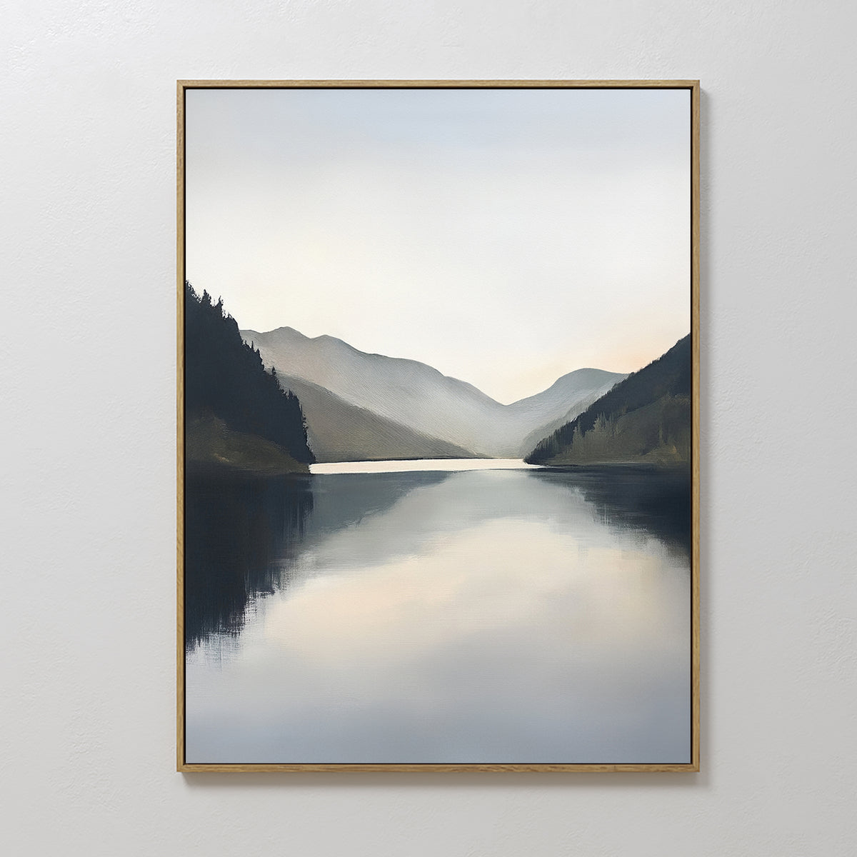 The Mirror Valley Canvas Art - Vertical features a calm lake amid dark, misty mountains under a cloudy sky, adding serene Nordic style and elegance to any plain white wall.