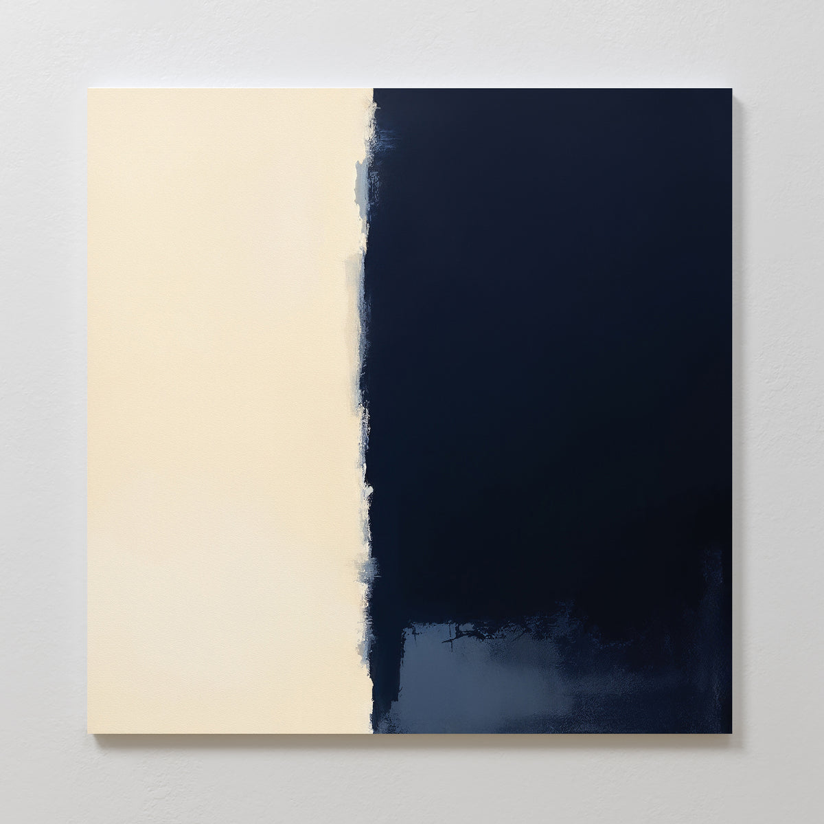 The Navy Division Canvas Art - Square features a minimalist design with a vertical split: soft beige on the left and deep navy blue on the right, seamlessly blended with an uneven brushed edge for modern, striking wall art.