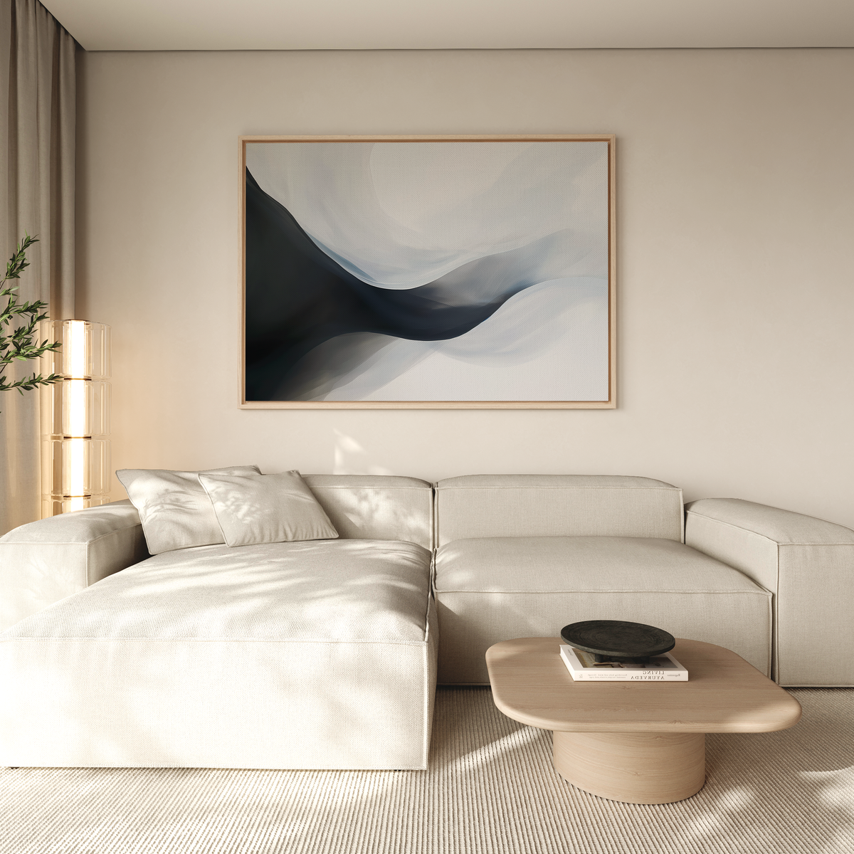 A modern living room with a cream sectional sofa and light wood coffee table features the Rippling Vista Abstract Canvas Art. Soft natural light from the left enhances the space’s calm, modern elegance and minimalist style.