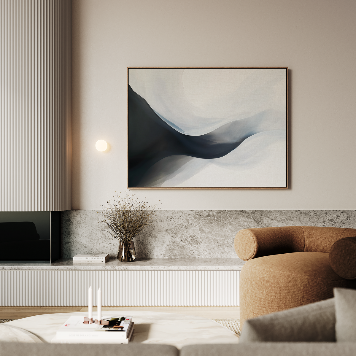 A modern living room with a brown curved sofa, a low marble shelf, minimalist decor, and the Rippling Vista Abstract Canvas Art featuring flowing blue and white shapes above the shelf for a touch of modern elegance.