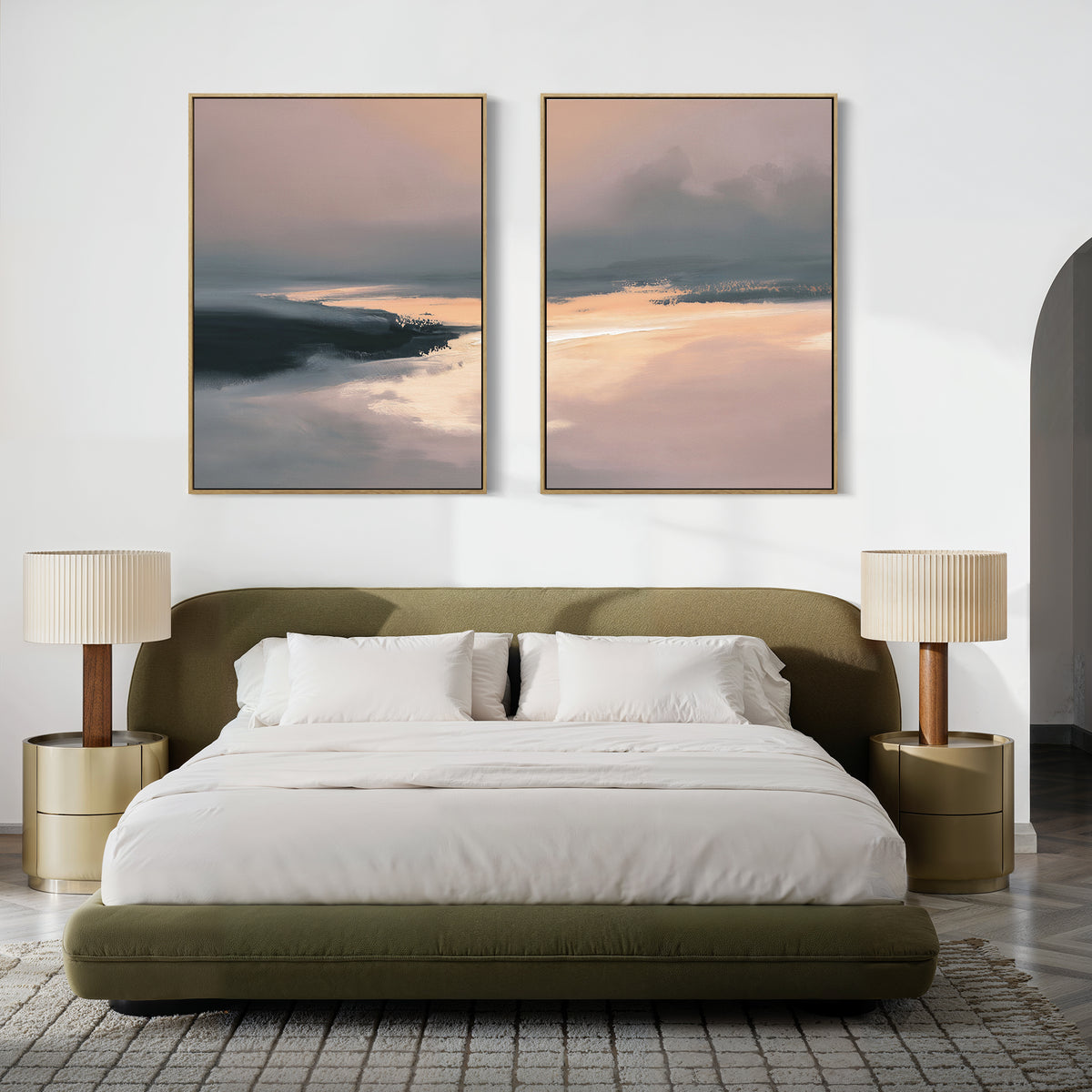 A modern bedroom with a green upholstered bed, white bedding, gold side tables, matching lamps, and the "Nordic Fjord - Set Of 2" peaceful wall art prints above the headboard on a crisp white wall.