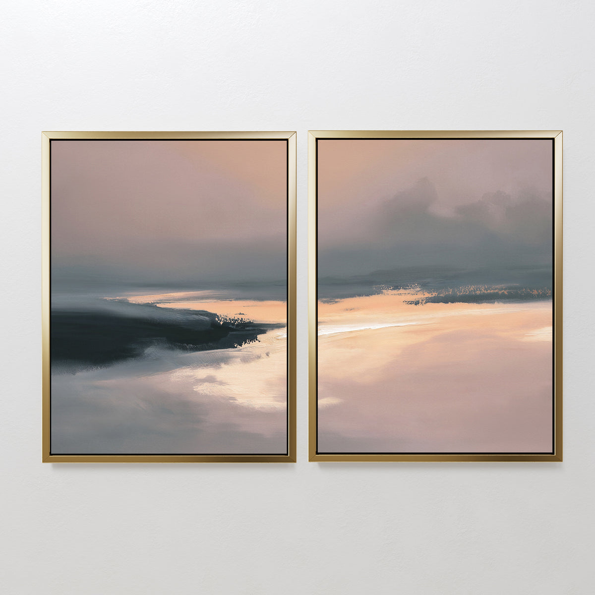 The Nordic Fjord - Set Of 2 features framed abstract prints in beige, peach, and dark grey with misty horizons—peaceful wall art ideal for living room decor, beautifully displayed side by side on a white wall.