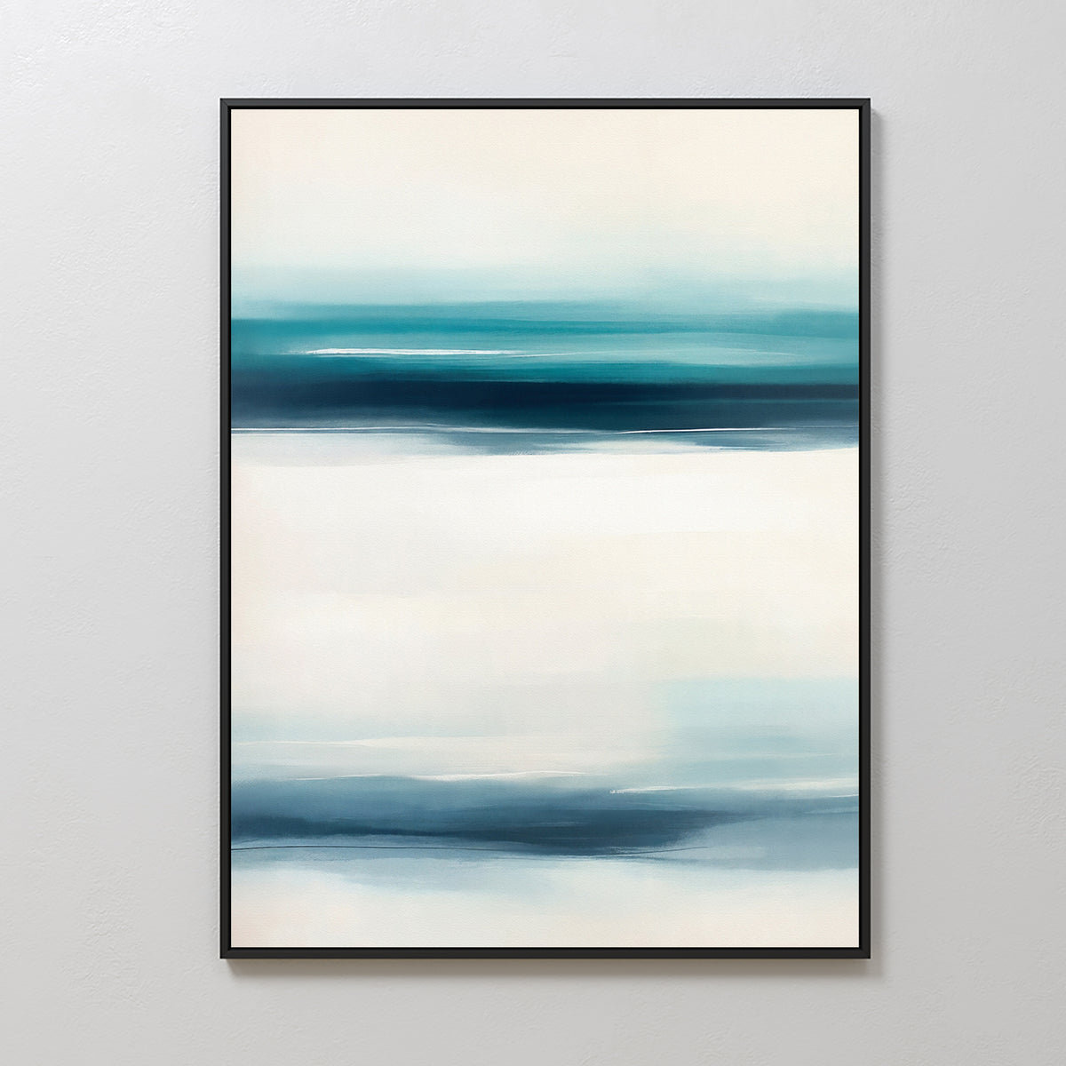 The Ocean Motion Canvas Art - Vertical features softly blended blue, teal, and white streaks. Framed in black and displayed on a light wall, it adds serene sophistication ideal for coastal decor.