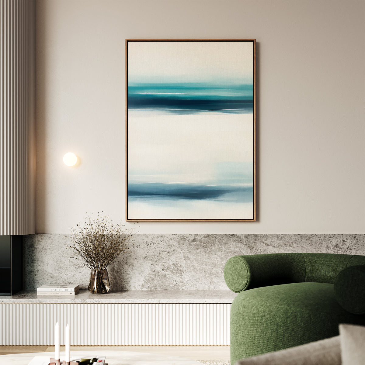 A modern living room with a green curved sofa, marble and wood console, coastal decor, dried branch vase, and the Ocean Motion Canvas Art - Vertical above soft lighting for serene sophistication.
