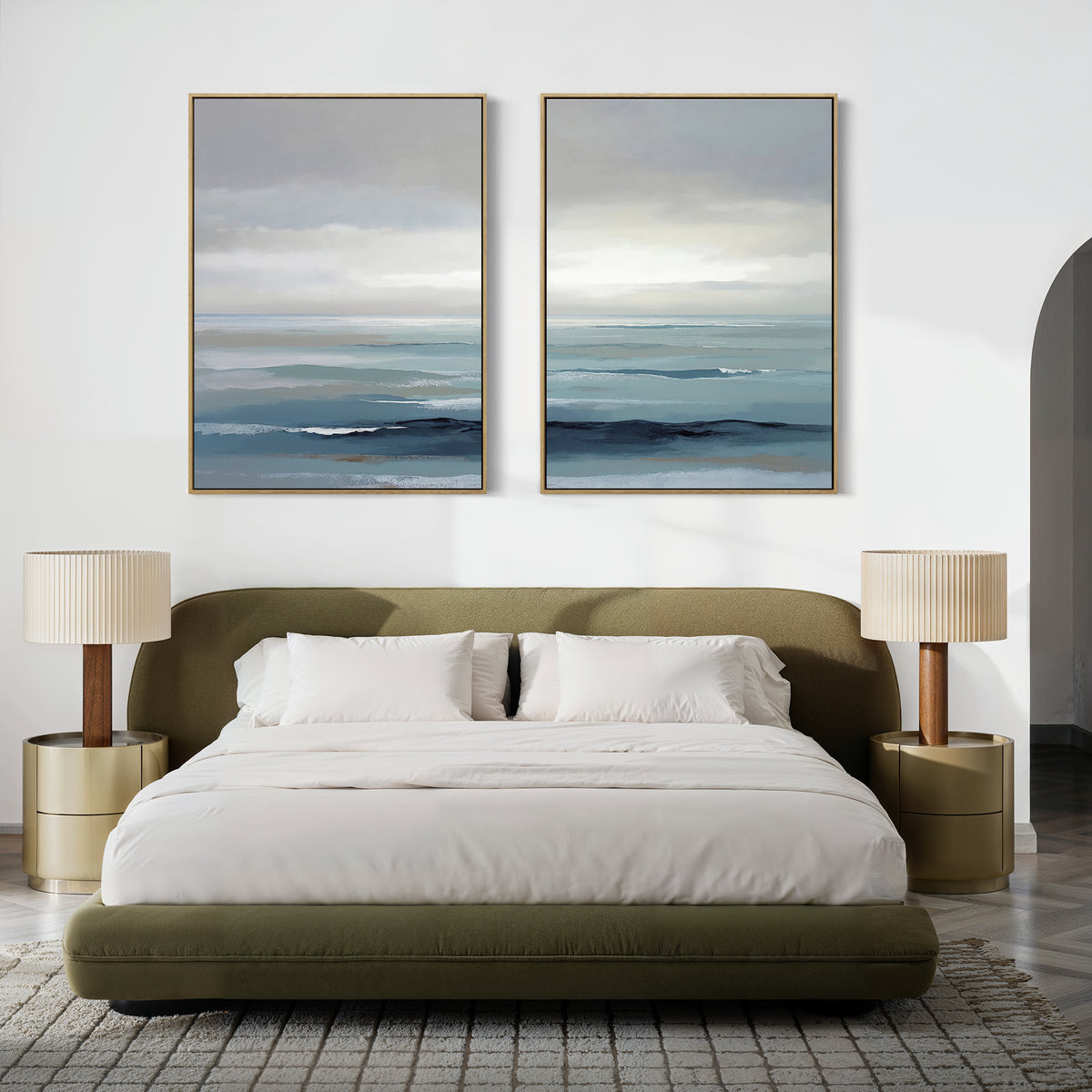 Modern bedroom featuring an olive green bed, white bedding, beige nightstands, and Ocean Swells - Set Of 2 wall art above the bed. Neutral tones and minimal decor evoke a calm atmosphere inspired by Nordic Park charm.