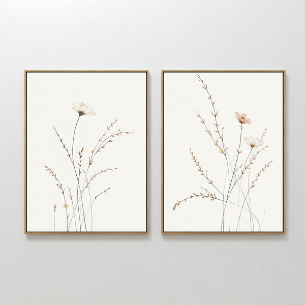 Prairie Whispers - Set of 2 features framed botanical wall art with delicate wildflowers and slender stems in soft, neutral tones, hung side by side—ideal for a Nordic Park-inspired space.