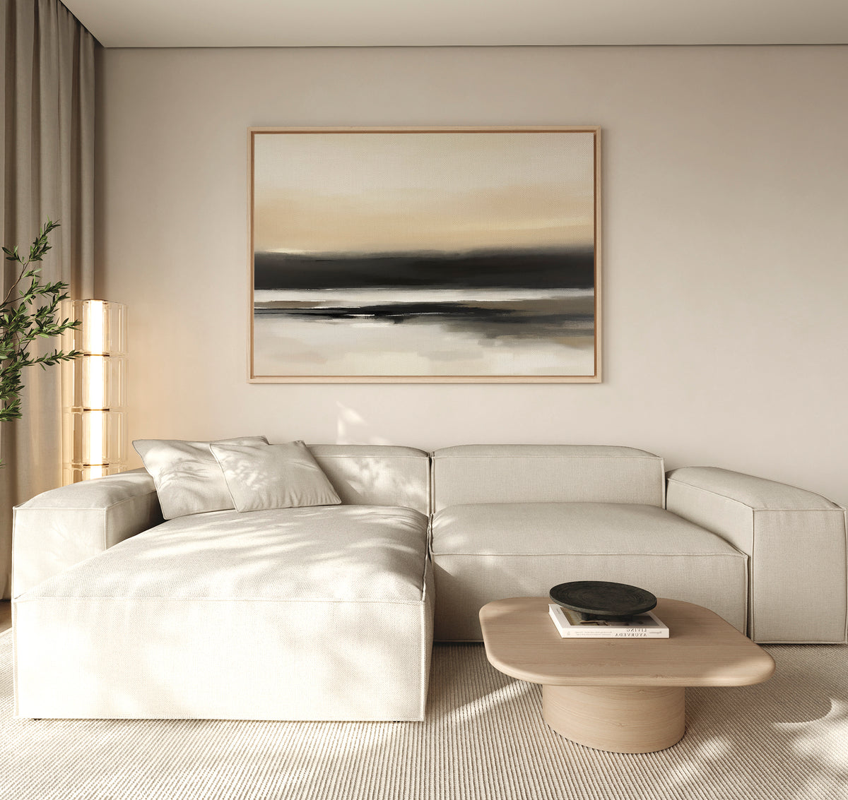 Minimalist living room featuring a light beige sectional sofa, wooden coffee table with black bowl, Quiet Shoreline Canvas Art - Horizontal on the wall, and a floor plant by the window. The décor is neutral and modern.