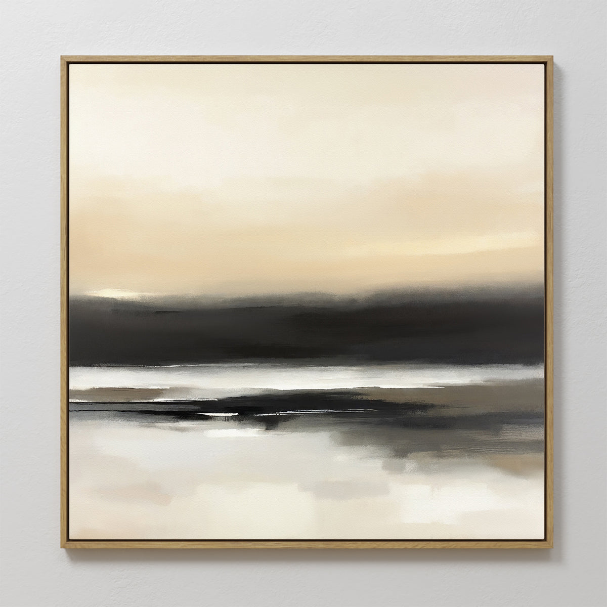 The "Quiet Shoreline Canvas Art - Square" features a gold-framed abstract painting with soft layers of beige, cream, gray, and black, evoking tranquil water reflections under a hazy sky—ideal for minimalist decor.