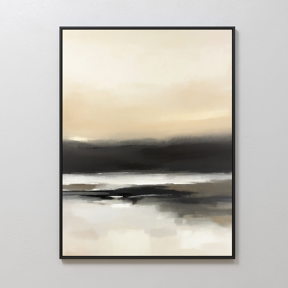 The Quiet Shoreline Canvas Art - Vertical features abstract coastal imagery with soft beige, cream, white, and dark gray layers, evoking a misty landscape. This serene framed piece is displayed on a light-colored wall.