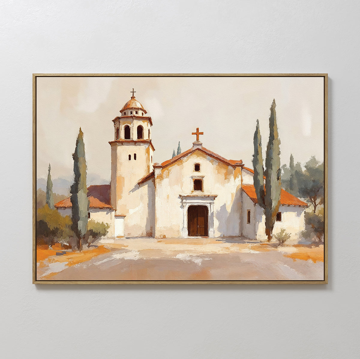 The "Sacred Courtyard Canvas Art - Horizontal" features a Spanish colonial church with a bell tower, arched doorway, red-tiled roof, and cypress trees—ideal terracotta wall art for a light, neutral space.