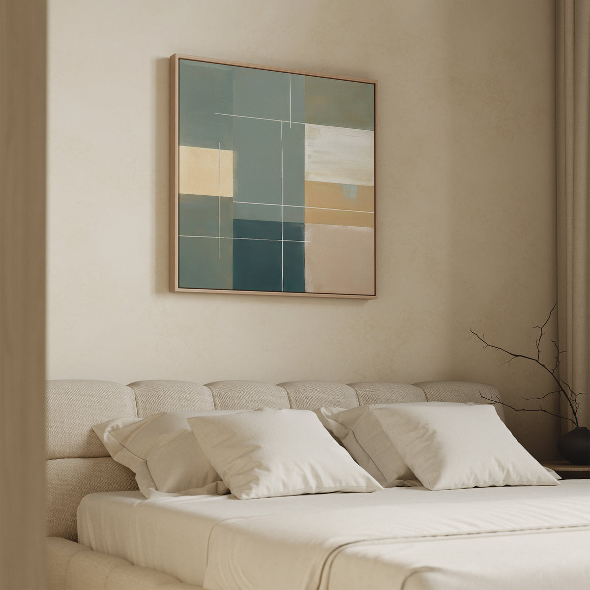 A modern bedroom with a beige bed and four white pillows features minimalist decor. Above the bed hangs the Sage Compartments Canvas Art - Square, showcasing geometric shapes in teal, yellow, white, and beige. A bare branch sits in a nearby vase.