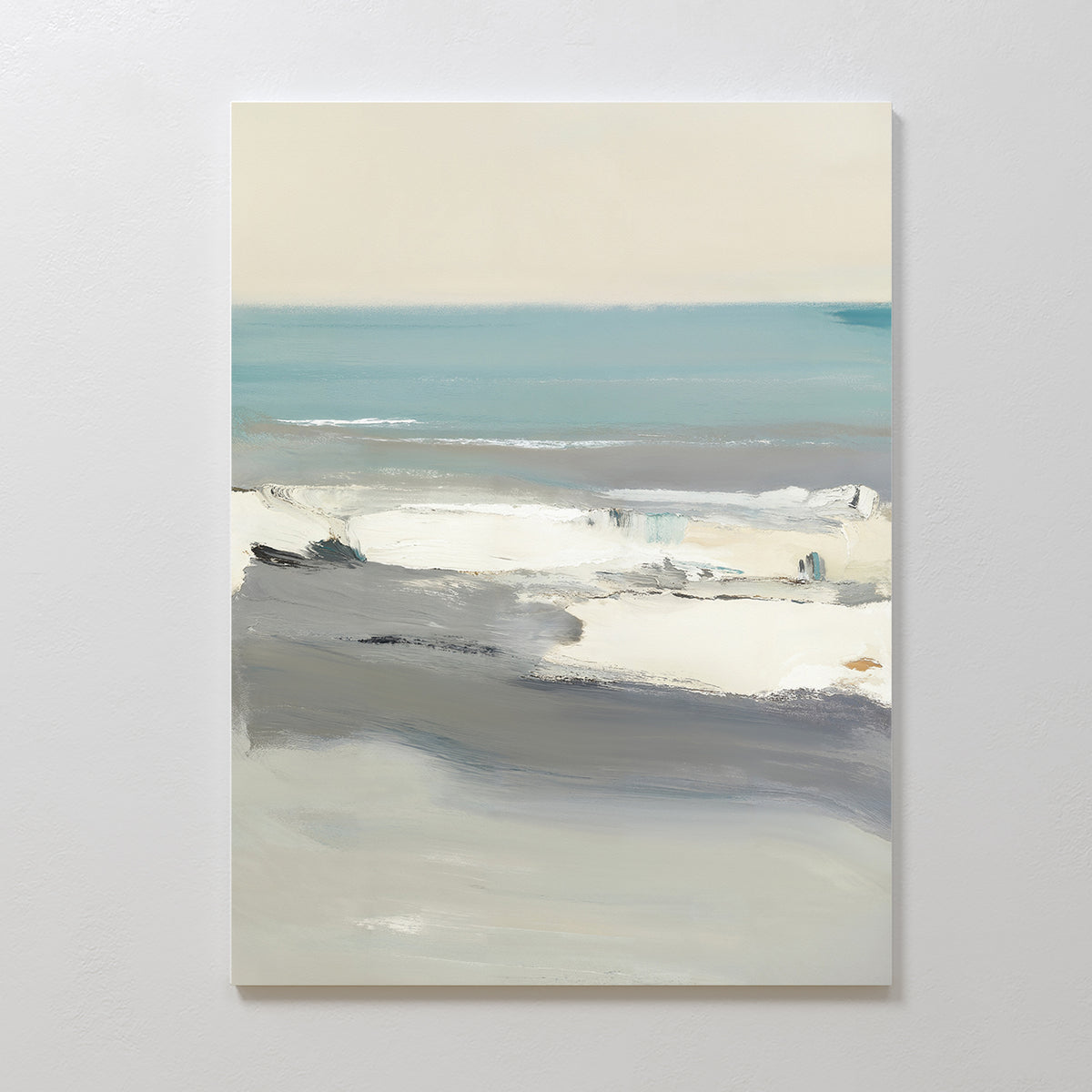 Sandy Retreat Canvas Art - Vertical is a minimalist abstract beachscape, blending soft blue, gray, and beige brushstrokes to evoke the ocean and sky in neutral light for serene seaside vibes.