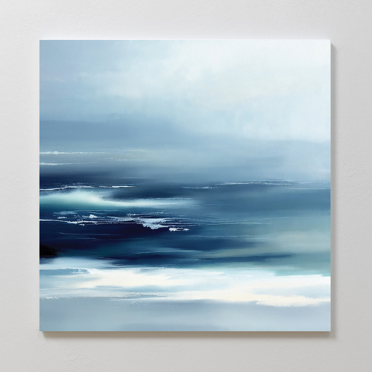 Sapphire Current Canvas Art - Square features cool blue and white tones with soft brushstrokes, evoking a misty seascape. This tranquil wall art brings serene, Nordic Park-inspired style to any space.