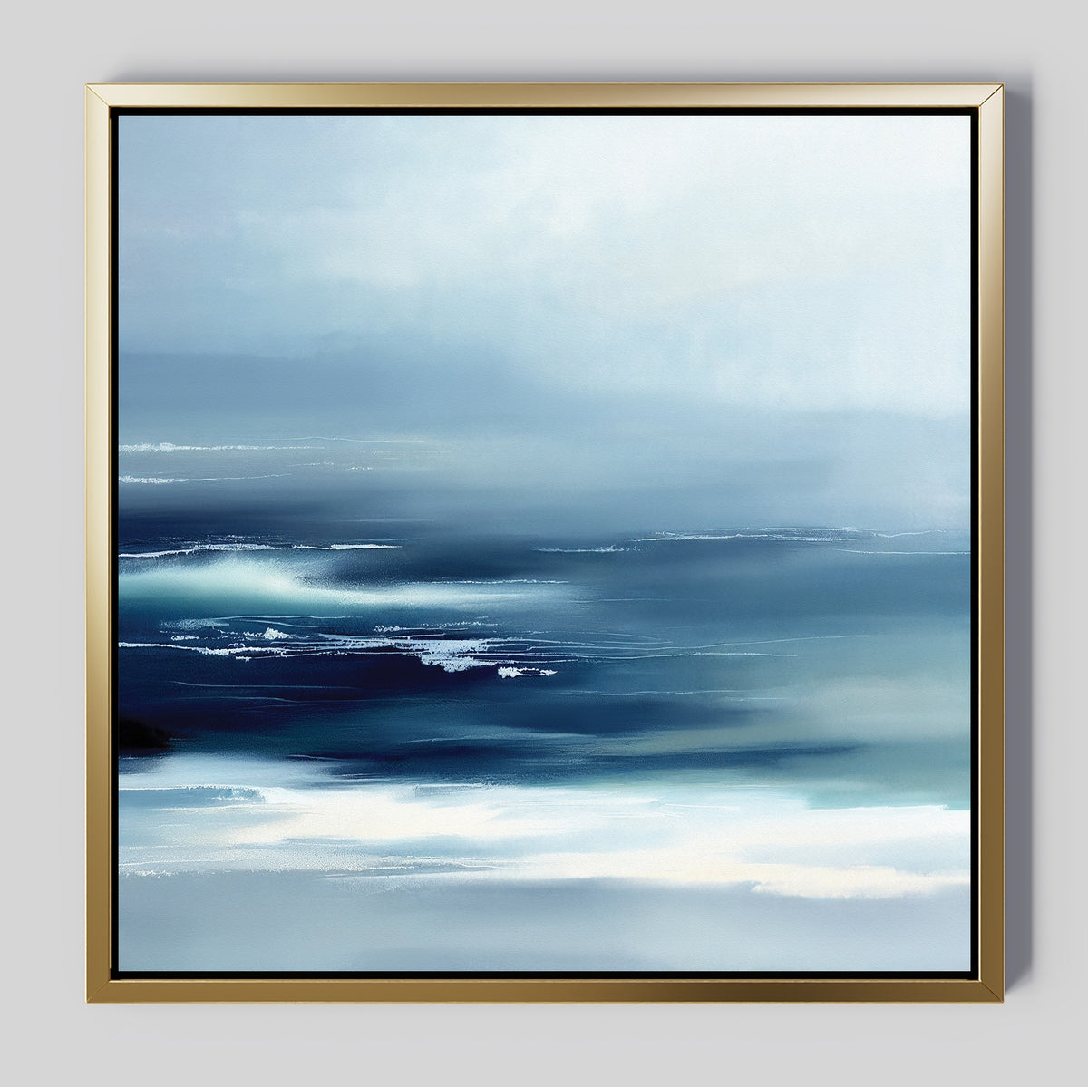 The Sapphire Current Canvas Art - Square is a serene abstract painting with soft blue, white, and navy hues reminiscent of an ocean scene. Its gold frame with a black inner edge adds a touch of elegance to any space.