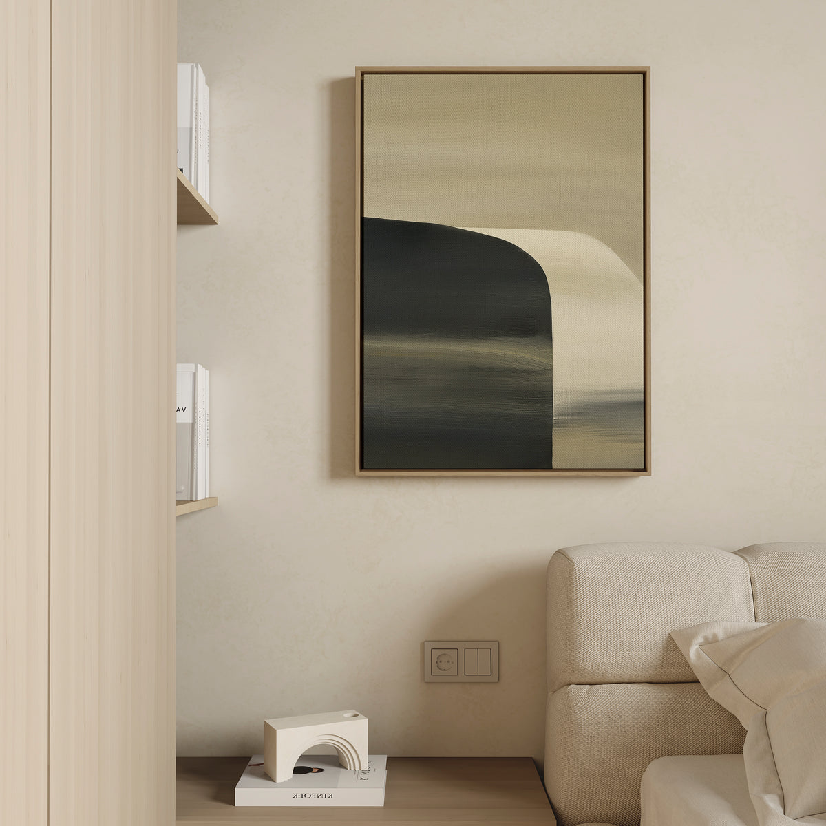 A minimalist living space with a beige wall, light sofa, built-in shelves, and wooden floor features the Sculptural Forms Canvas Art - Vertical in neutral tones—an ideal modern decor piece for contemporary living rooms.