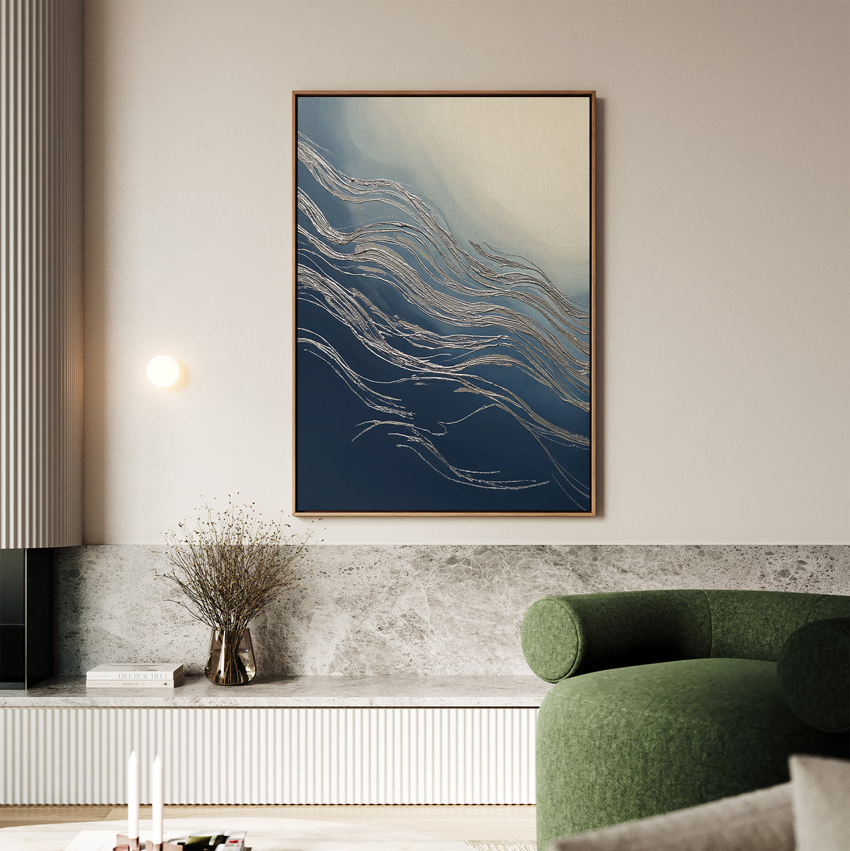 A modern living room with a green sofa, marble bench, vase of dried flowers, and Silver Current Canvas Art - Vertical brings contemporary sophistication to the light-colored space.