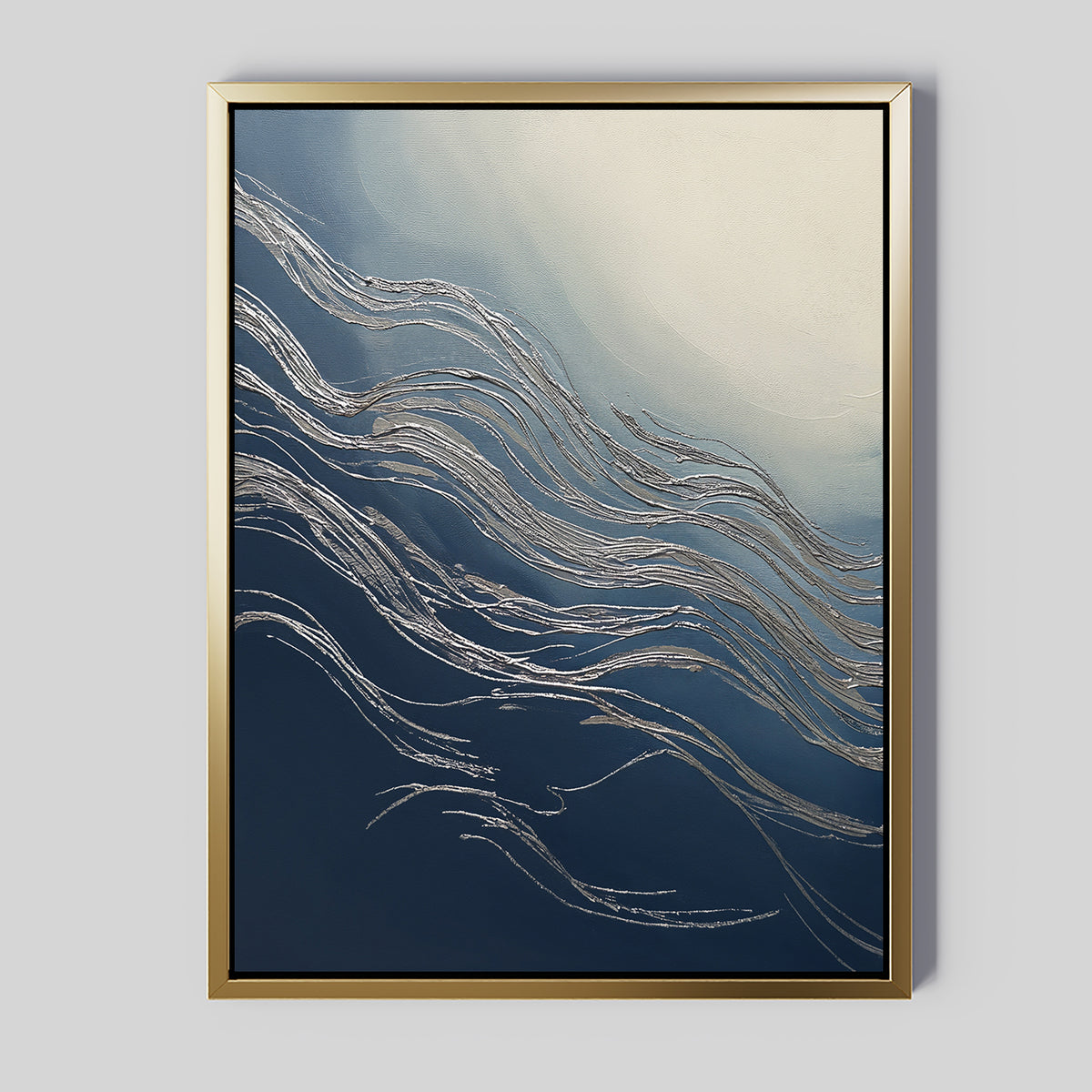 Silver Current Canvas Art - Vertical features flowing silver lines on a dark blue background with a light gradient at the top. Set in a gold frame, this abstract wall art adds contemporary sophistication to any space.