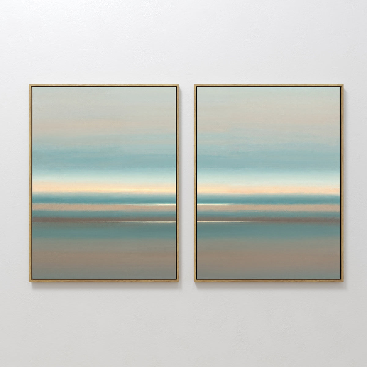 Soft Tide Layers - Set Of 2: Framed abstract prints featuring soothing horizontal bands in blue, beige, and tan evoke a tranquil seascape—ideal coastal wall art for any white wall.