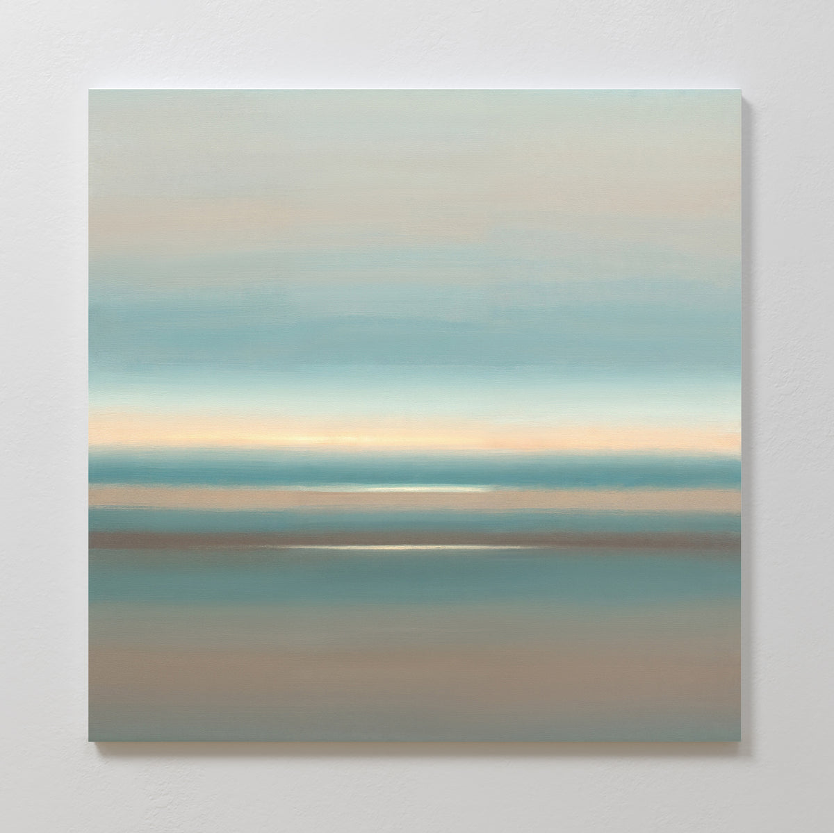 The Soft Tide Layers Canvas Art - Square features soft, horizontal bands of blue, beige, and brown for a tranquil, misty landscape vibe. This calming abstract print adds serene coastal style to any room when mounted on a light-colored wall.