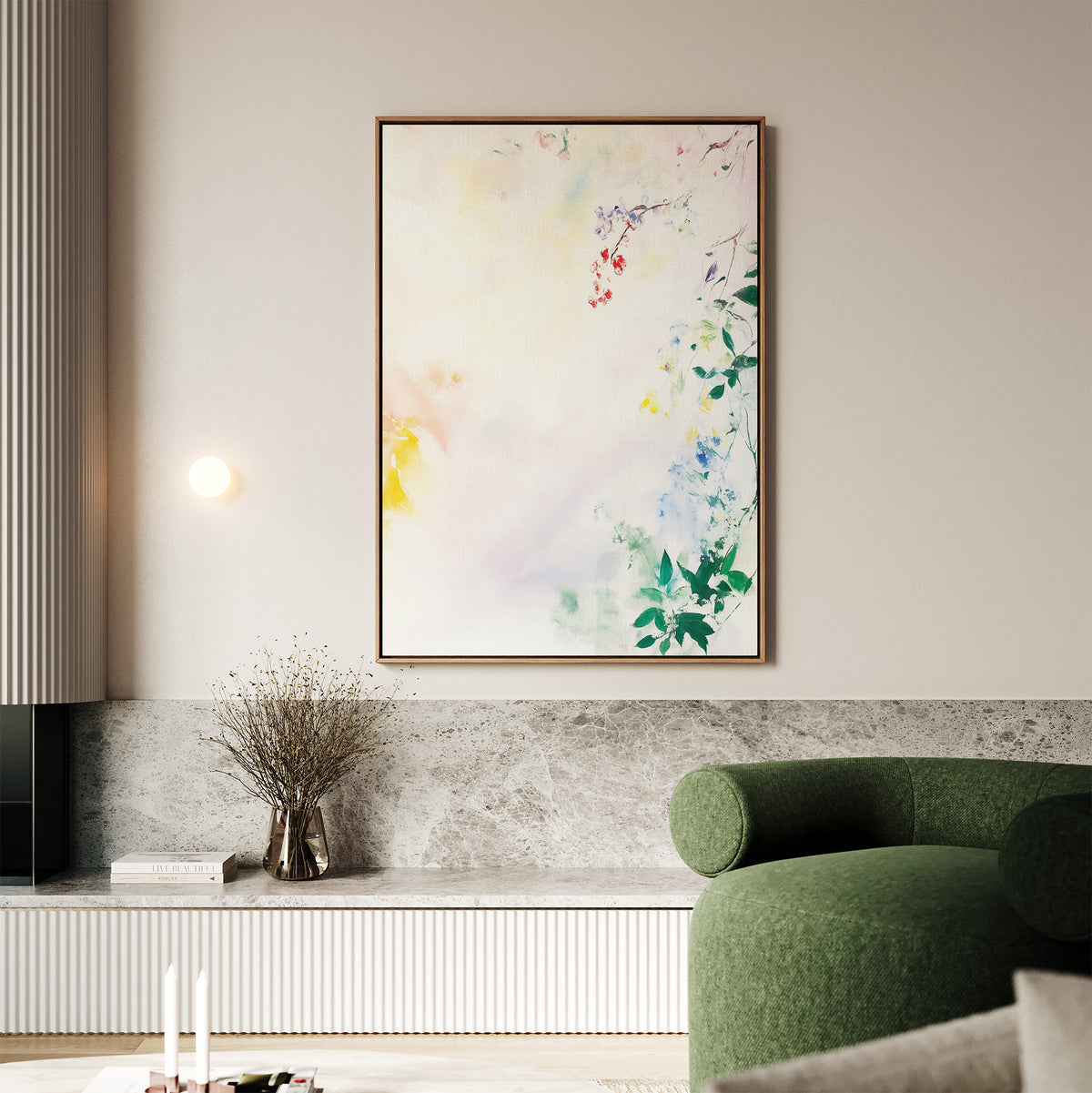 A modern living room highlights the Spring Reverie Canvas Art - Vertical with soft pastel tones above a low marble shelf, paired with a green curved sofa and a vase of dried branches for an inviting floral home decor touch.
