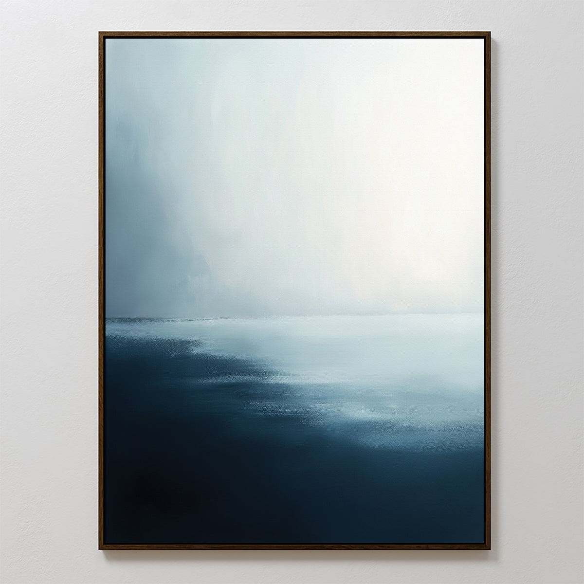 Steel Harbor Mist Canvas Art - Vertical features an abstract gradient from deep blue to pale blue and white, evoking a misty seascape. Perfect for a serene living room, it comes framed with a slim, dark border.