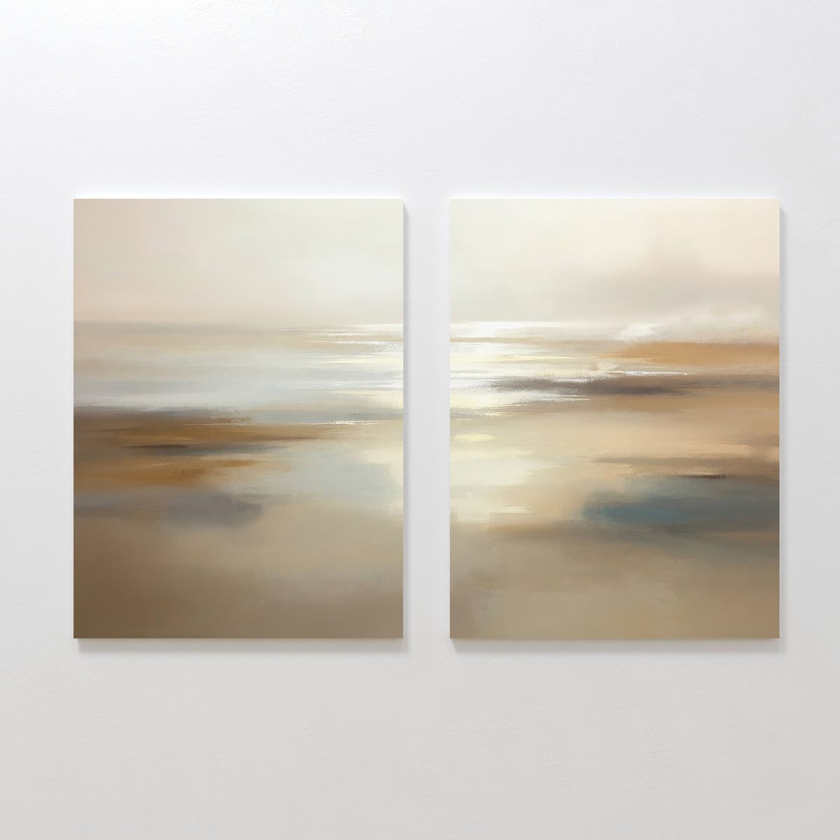Sunlit Waters - Set Of 2: Two abstract canvas paintings with soft, blurred tones of beige, tan, white, and blue. This serene wall art duo evokes gentle reflections and sunlit waters, ideal for creating a calming atmosphere in your space.