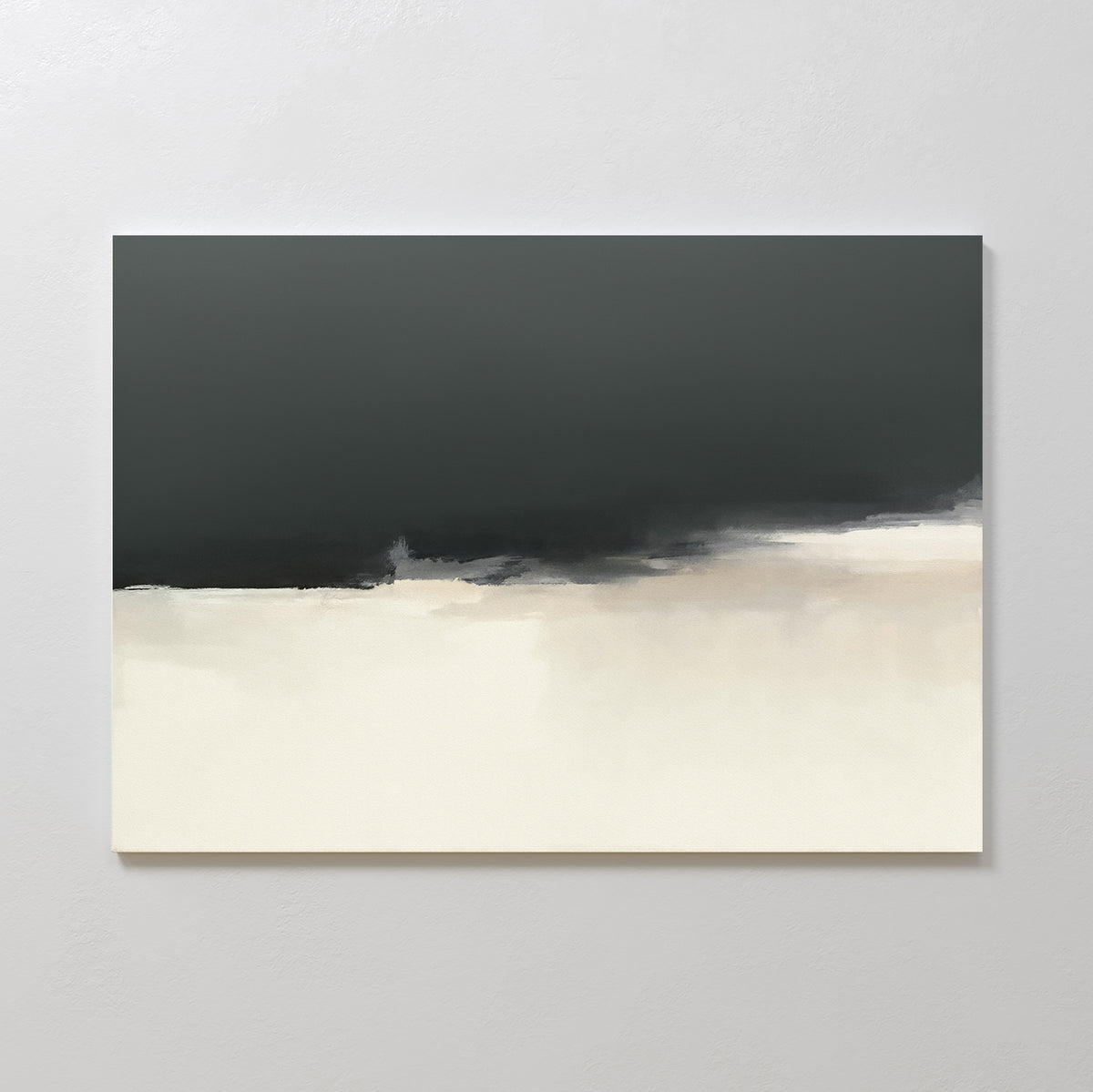 The Tempest Brewing Canvas Art - Horizontal features a broad dark gray band at the top, blending into off-white and beige below for a soft, minimalist look. Displayed here on a light-colored wall.