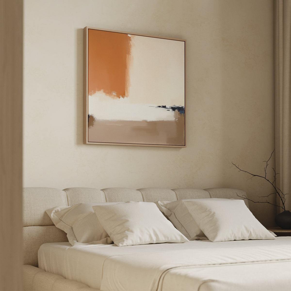 A beige bedroom with a cushioned headboard, neatly made bed with white pillows and sheets, minimalist decor, and Terracotta Edge Canvas Art - Square featuring orange, beige, white, and dark blue above the bed.