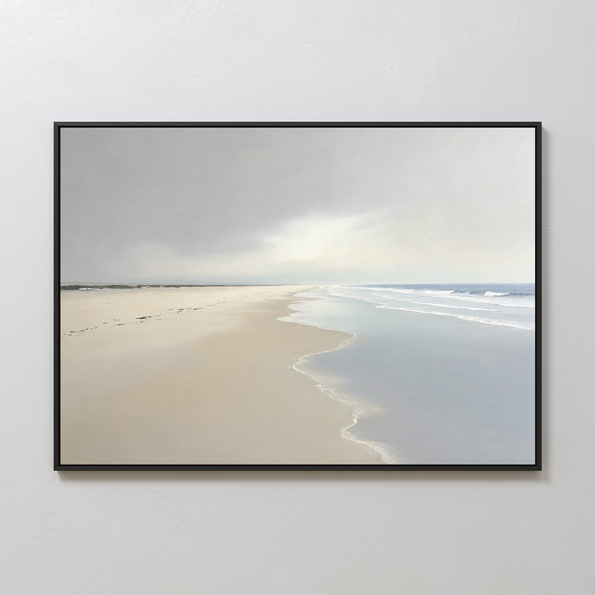 Tidal Reflections Canvas Art - Horizontal features a calm, empty beach with gentle waves and a cloudy horizon. Faint footprints line the wet sand, making it perfect calming wall decor for lovers of serene ocean art.