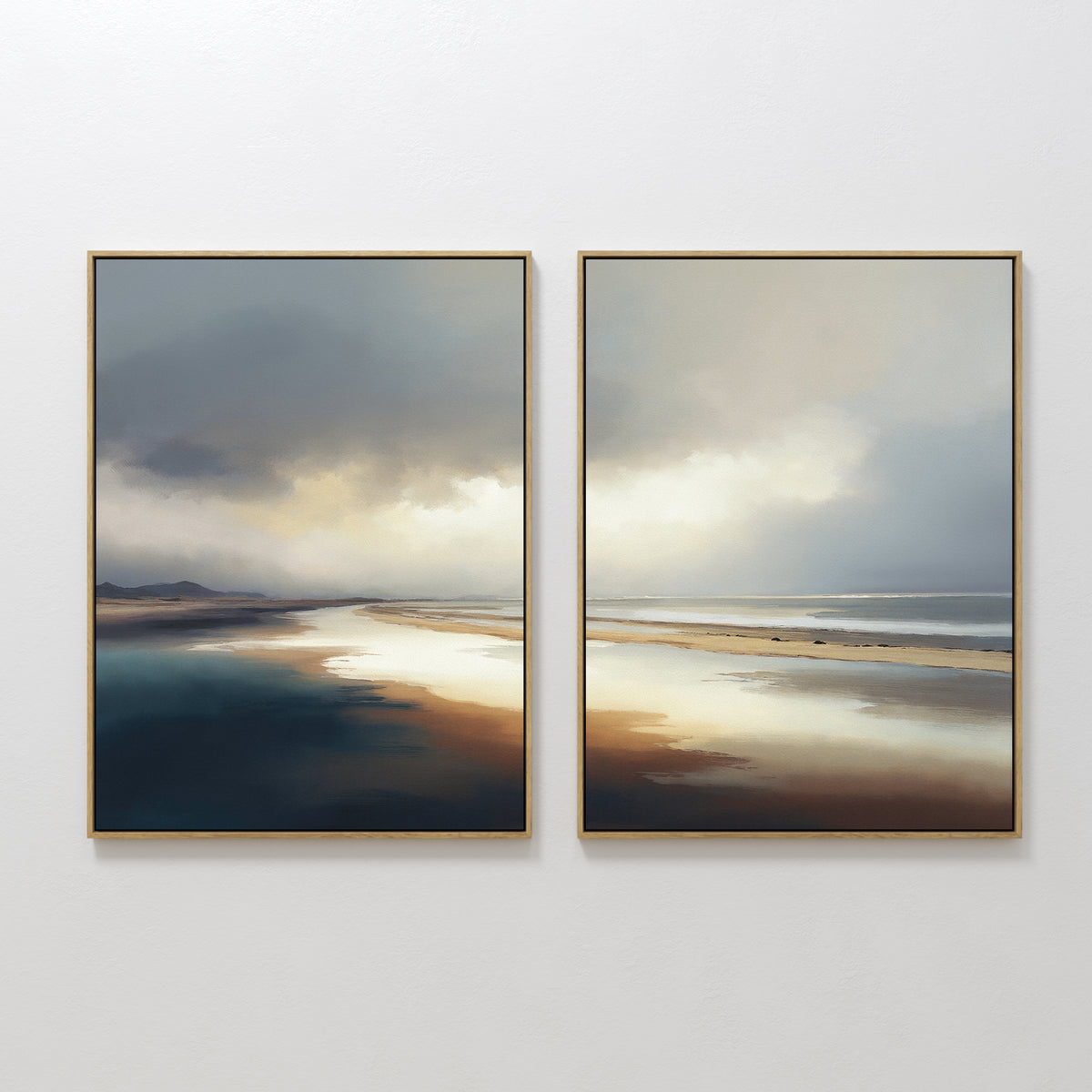 Tidal Reverie - Set of 2 features framed coastal wall art, each piece capturing a serene beach landscape with reflective water, soft sand, distant mountains, and a cloudy sky in muted blue, brown, and white tones.