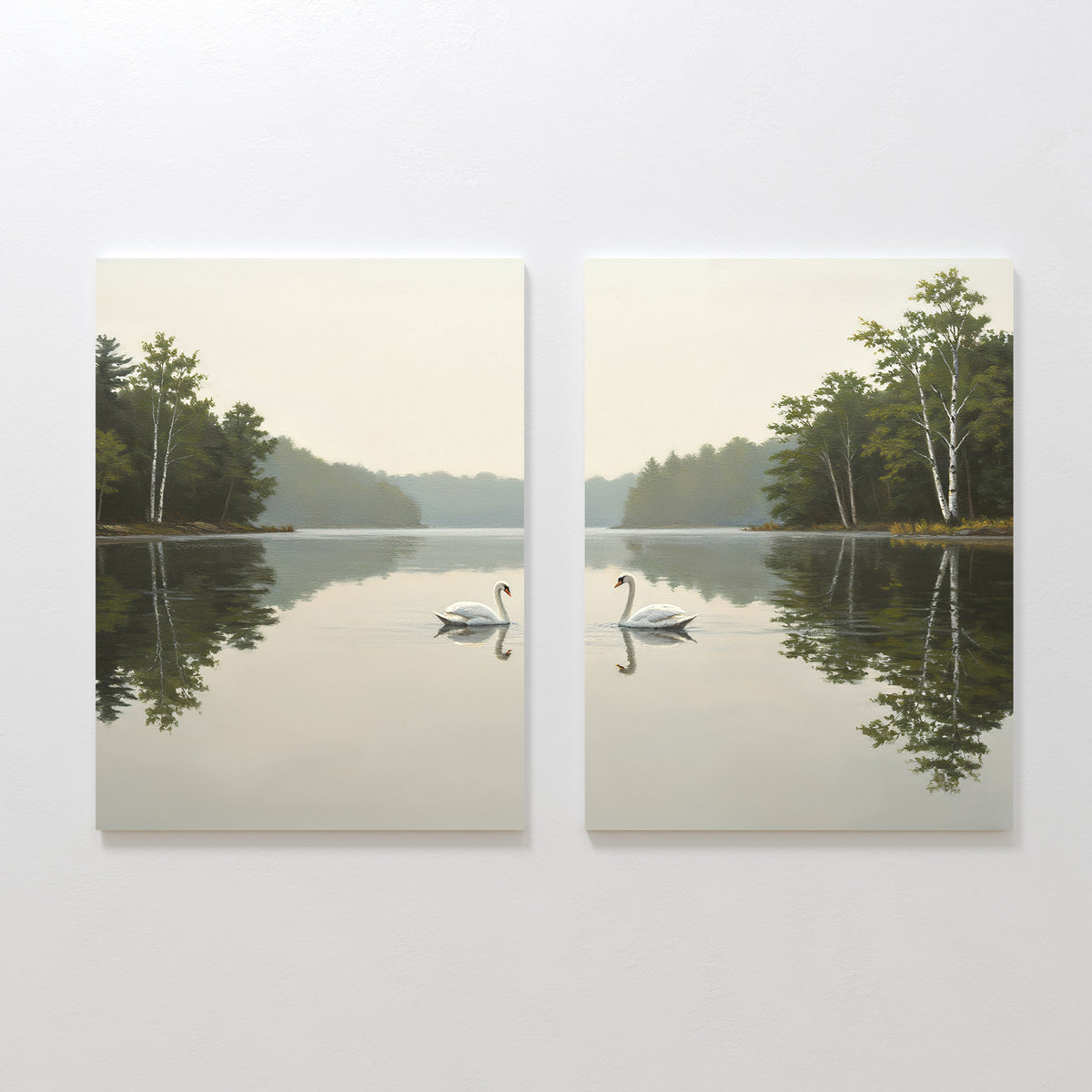 The Twin Swans Serenity - Set Of 2 features two canvas paintings of swans gliding on a tranquil lake, with reflected trees and a misty ambiance—ideal for adding calm, Nordic-inspired decor to your home.