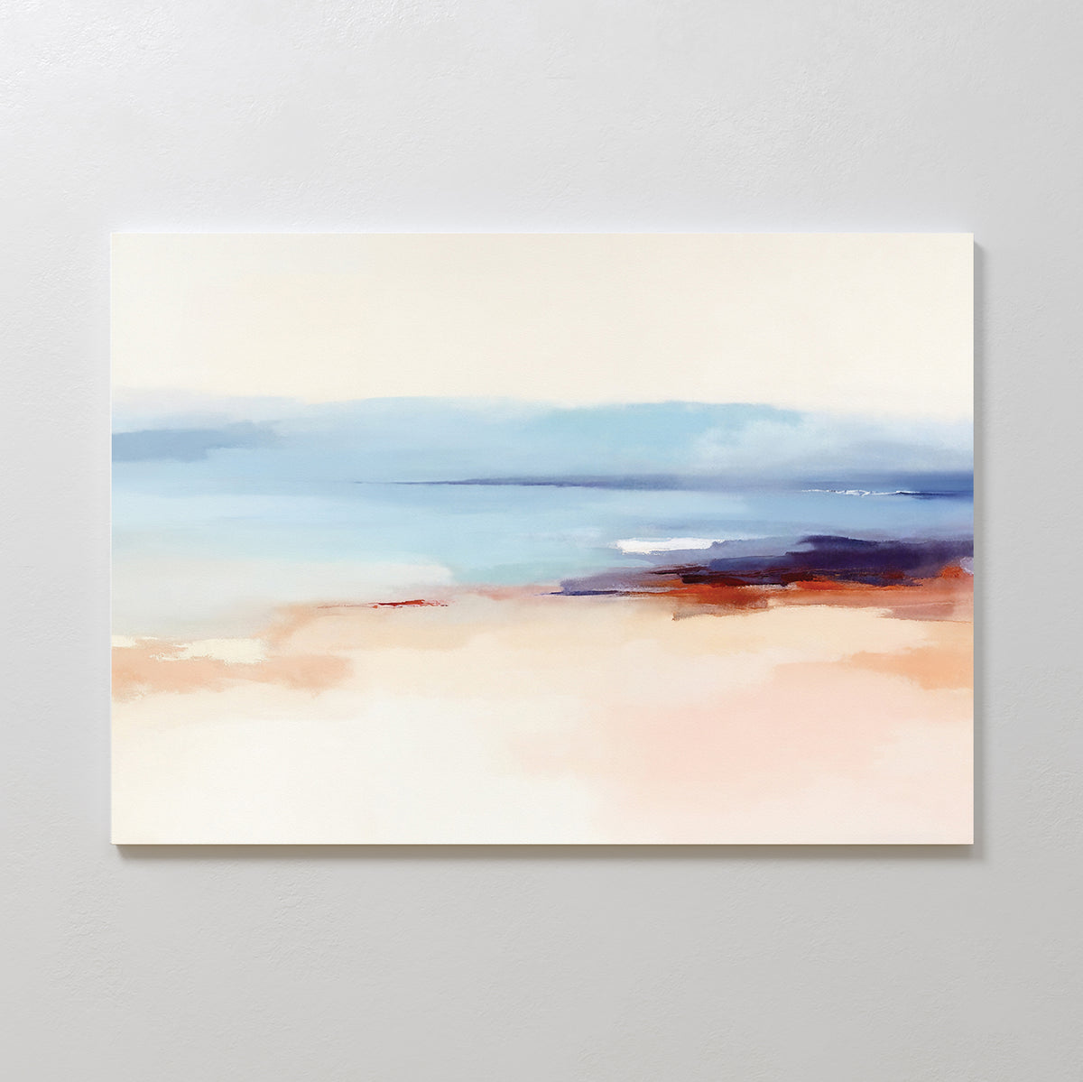 Windswept Coastline Canvas Art - Horizontal features soft, blurred shades of beige, peach, blue, and white to evoke a tranquil seascape—perfect as serene coastal wall art for your space.