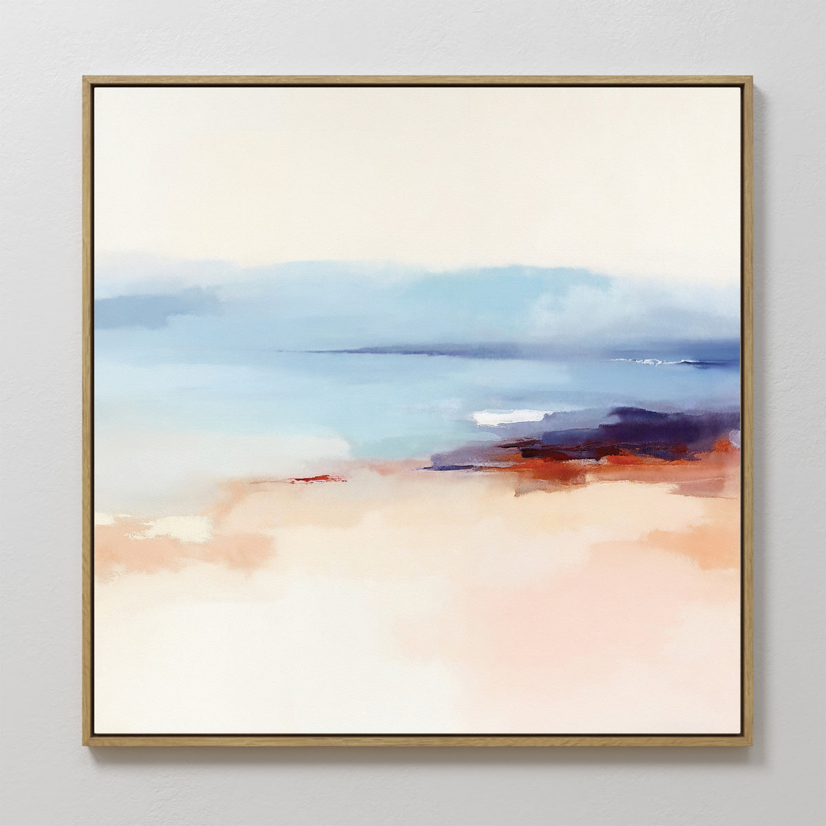 The Windswept Coastline Canvas Art - Square features a serene abstract landscape in soft blended pastels—blue, white, peach, brown, with hints of purple and red—framed in gold. Perfect for adding dreamy coastal wall art to your space.
