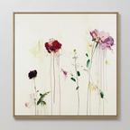 The Wild Flower Canvas Art showcases abstract blossoms in red, purple, and pink with green stems and leaves, featuring bold watercolor-style strokes and drips on a white background for a modern floral look.