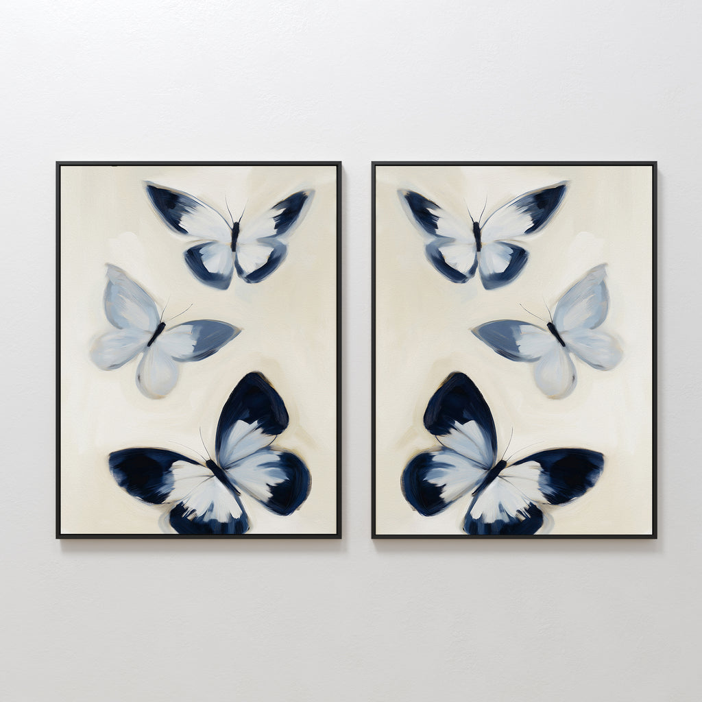 The Midnight Wings Set of 2 features side-by-side framed prints with three abstract blue and white butterflies on light beige—ideal butterfly wall art for modern decor with a hint of Nordic Park elegance.