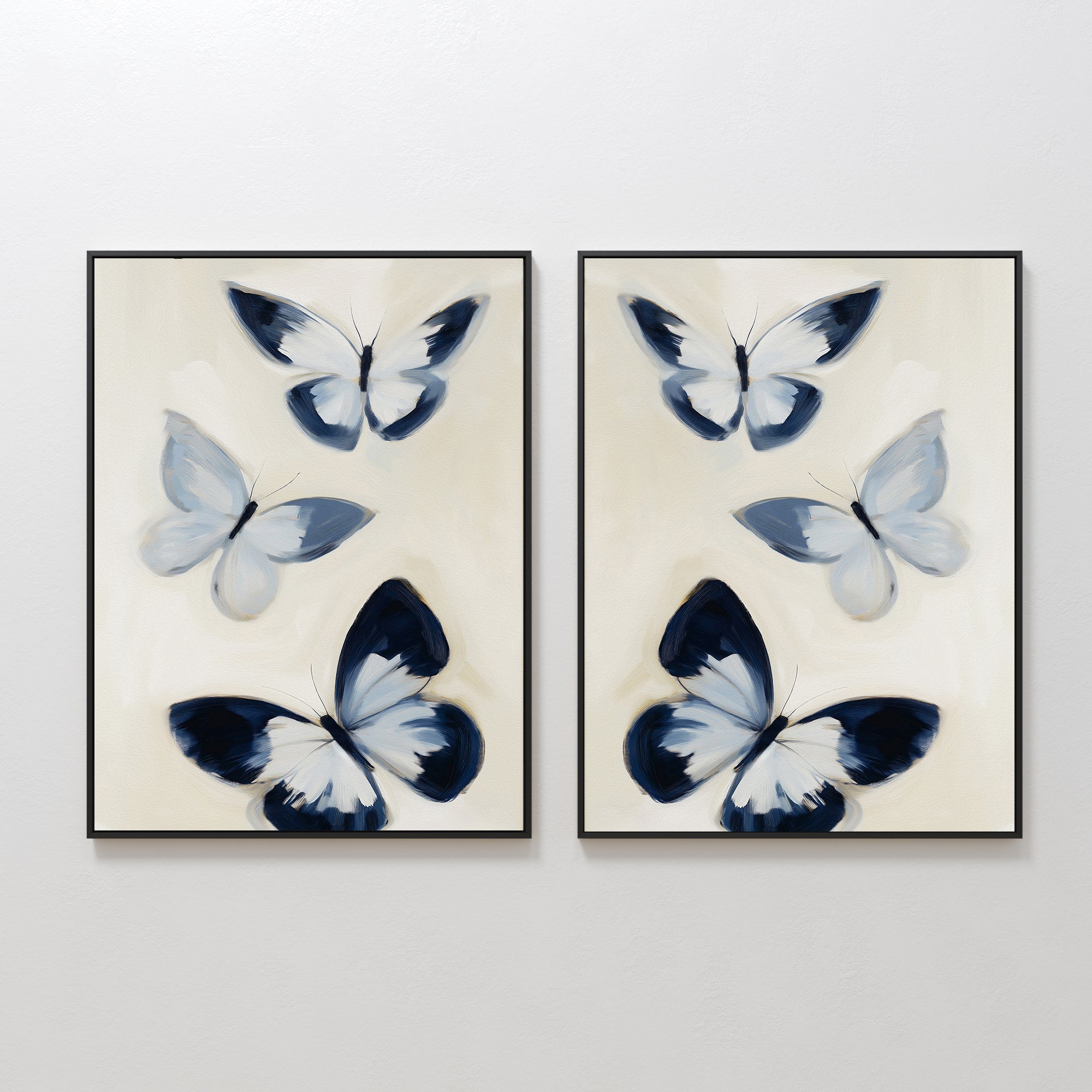 The Midnight Wings Set of 2 features side-by-side framed prints with three abstract blue and white butterflies on light beige—ideal butterfly wall art for modern decor with a hint of Nordic Park elegance.