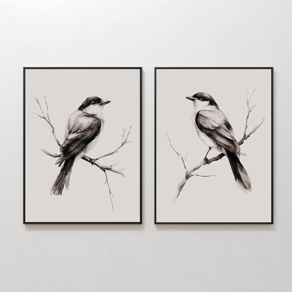 The Still Perch Set of 2 features framed black-and-white prints of birds perched on bare branches, facing right—an elegant, neutral-toned wall art pair ideal for adding a Nordic Park-inspired touch to any space.