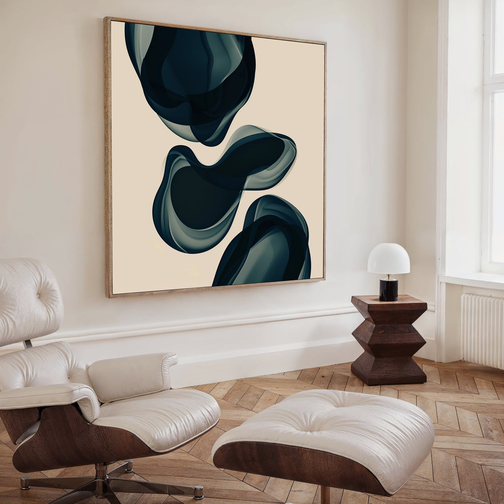 A modern living room featuring Deep Sea Hues Abstract Canvas Art by My Store, a white leather lounge chair and ottoman, a dark wood side table with a dome lamp—perfect for stylish decor with ocean-inspired appeal.