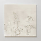 Floral Symphony Abstract Canvas Art features delicate beige wildflower and grass silhouettes on a soft, neutral square canvas—perfect for adding a serene touch to your living room decor.