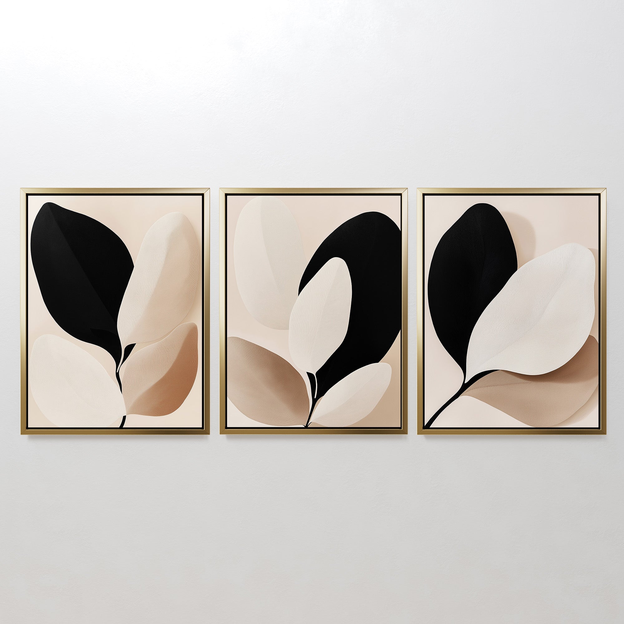 The Monochrome Flora Set of 3 features framed minimalist botanical prints in neutral black, beige, and cream tones—ideal for modern living room decor.
