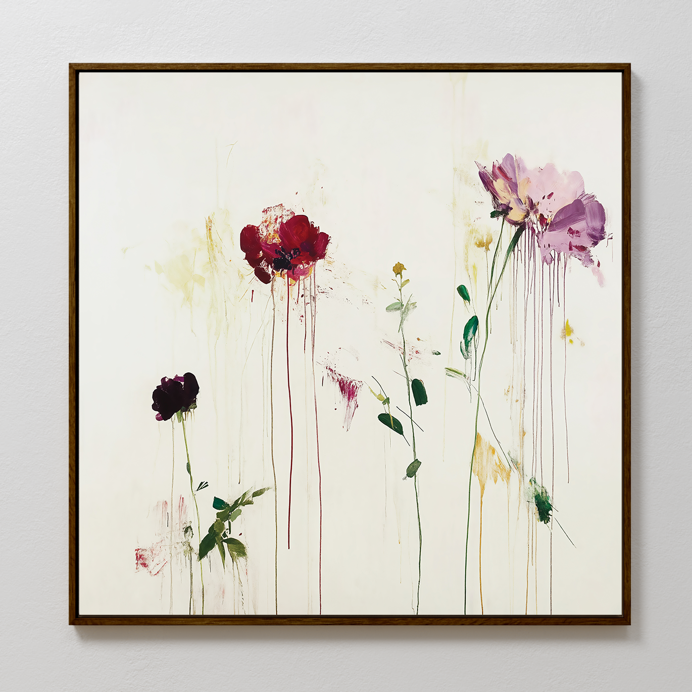 The Wild Flower Canvas Art is a framed modern floral piece featuring abstract red, purple, and pink flowers with paint drips on white. This expressive canvas brings a bold, contemporary flair to any room.