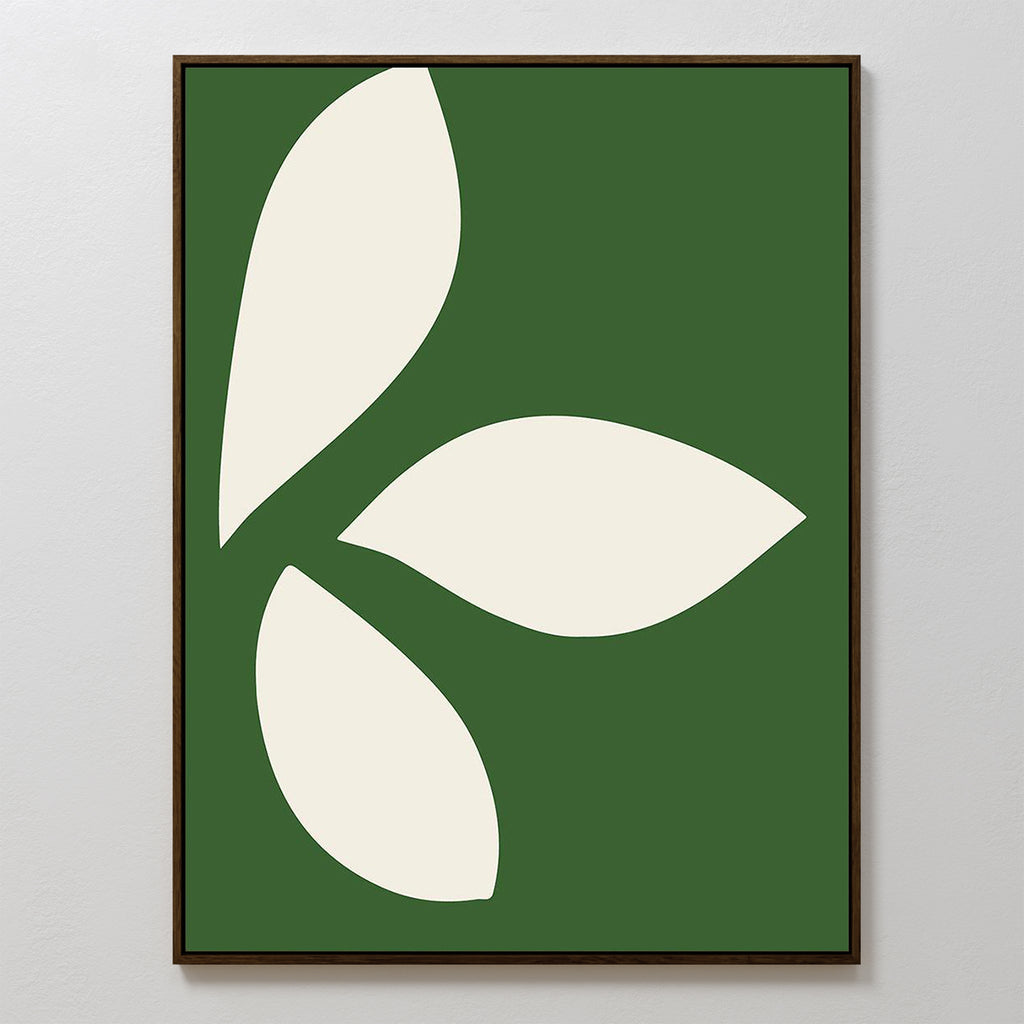 The Leaf Silhouette Abstract Canvas Art features three large, off-white, rounded leaf shapes on a dark green background—an ideal minimalist piece to bring modern elegance to your living room decor.