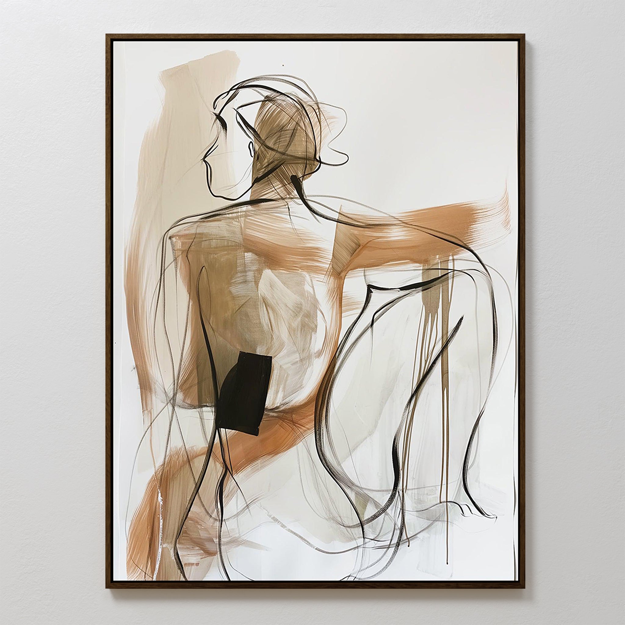Sitting Silhouette Abstract Canvas Art features line art of a seated figure, viewed from the back, with loose black and brown brushstrokes on a white background. Artwork is framed in thin brown wood for a modern, minimalist look.