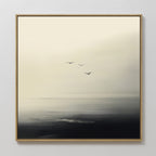 The Above the Calm Canvas Art features three birds soaring over a misty seascape in soft, muted tones—ideal as minimalist wall art or bedroom decor to bring a serene, tranquil atmosphere to your space.