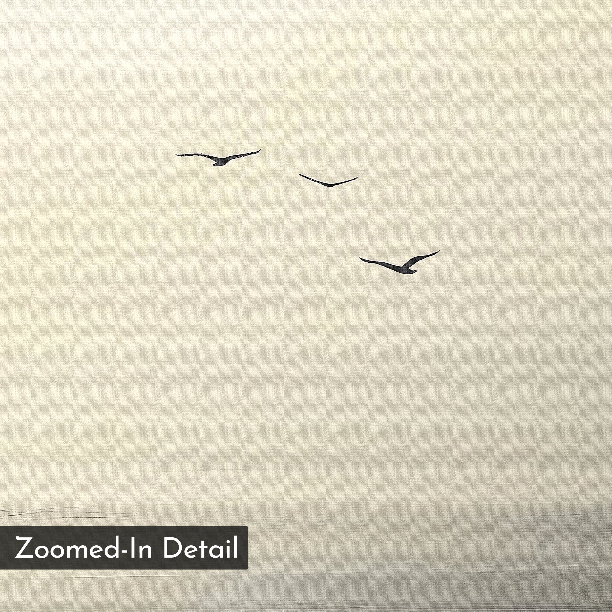 Three birds soar across a pale sky above tranquil water in "Above the Calm Canvas Art"—a perfect minimalist wall decor for modern, serene spaces. "Zoomed-In Detail" is displayed in the bottom left corner.