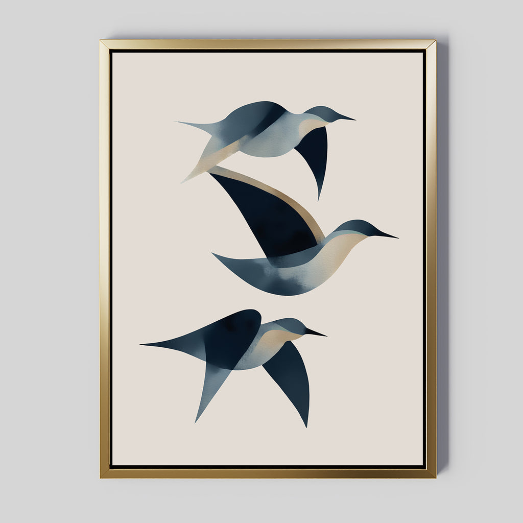 Abstract Birds in Motion Canvas Art features three blue and beige abstract birds flying on a light backdrop, set in a slim gold frame. This minimalist wall print brings Nordic Park-inspired elegance to any space.