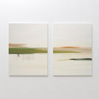 The Abstract Horizons Set of 2 features minimalist paintings with horizontal bands of soft green, beige, and orange tones on white canvas, evoking blurred landscapes. Display them side by side for a serene wall accent.